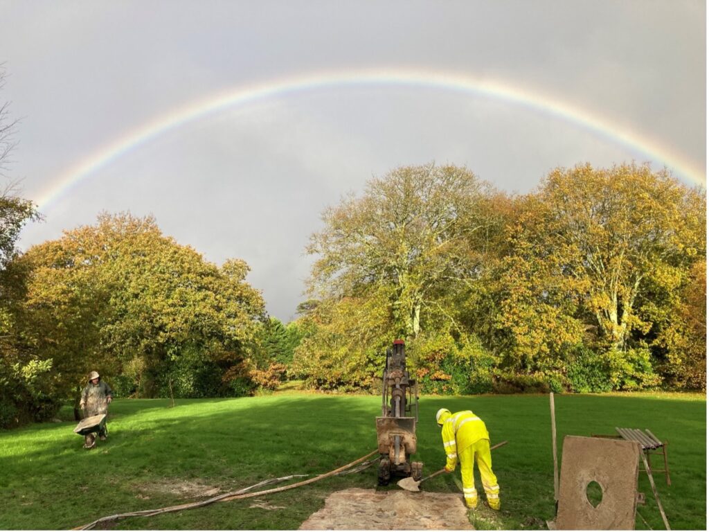 Drilling in Cornwall with rainbow back drop